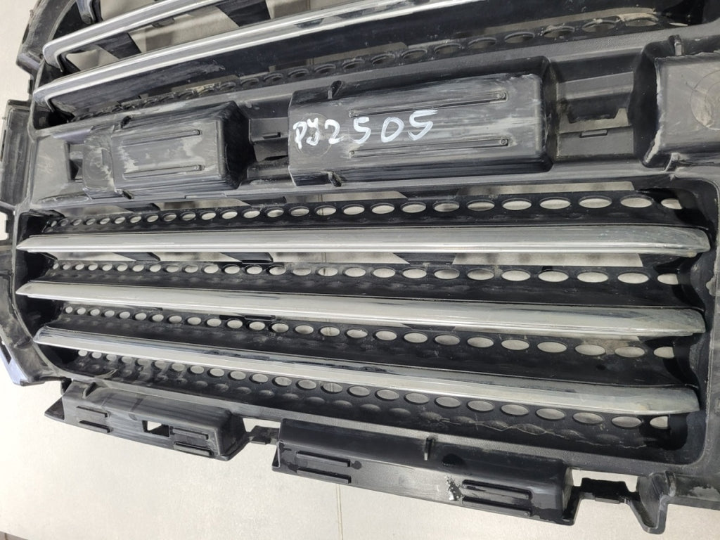 Maska (grill) atrapa mocowanie desna DODGE RAM 3500 14-15