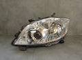 Prednji far TOYOTA AURIS I LIFT halogen SOCZEWKALH lijevi 09-12 81150-02540