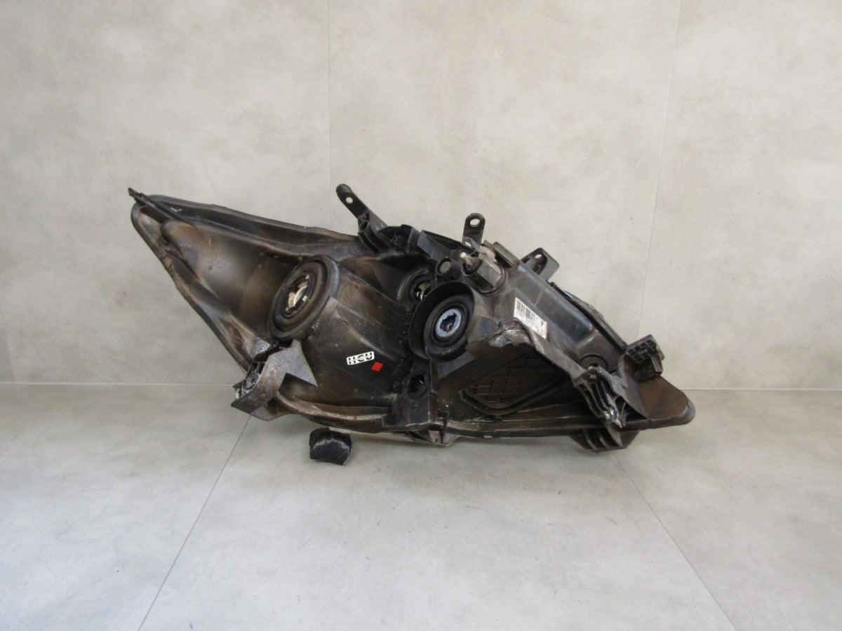 Prednji far TOYOTA AURIS I LIFT halogen SOCZEWKALH lijevi 09-12 81150-02540