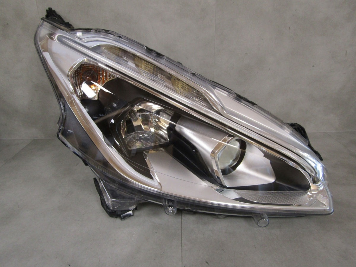 Prednji far PEUGEOT 208 I LIFT halogen sa sočivom 15-19 desni RH 9810805880