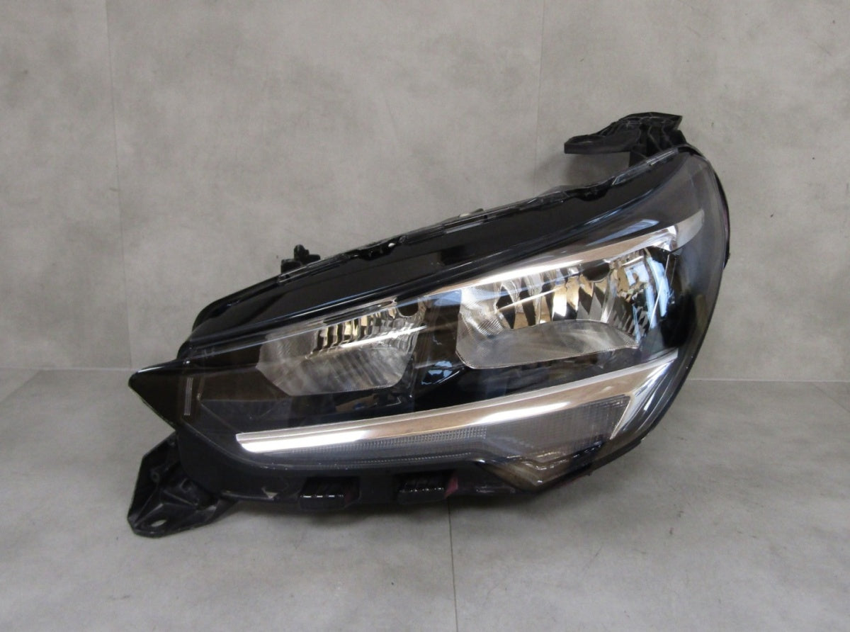 Prednji far OPEL CORSA F halogen 19-23 LH lijevi 9829465580