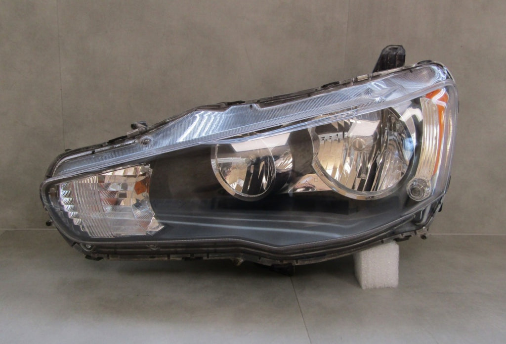 Prednji far MITSUBISHI LANCER 8 VIII halogen LH 07-