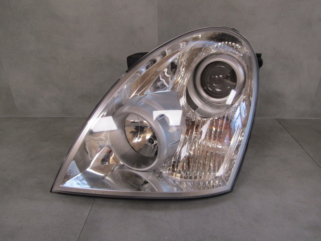 Prednji far Ssangyong Rexton LIFT halogen 06-12 LH