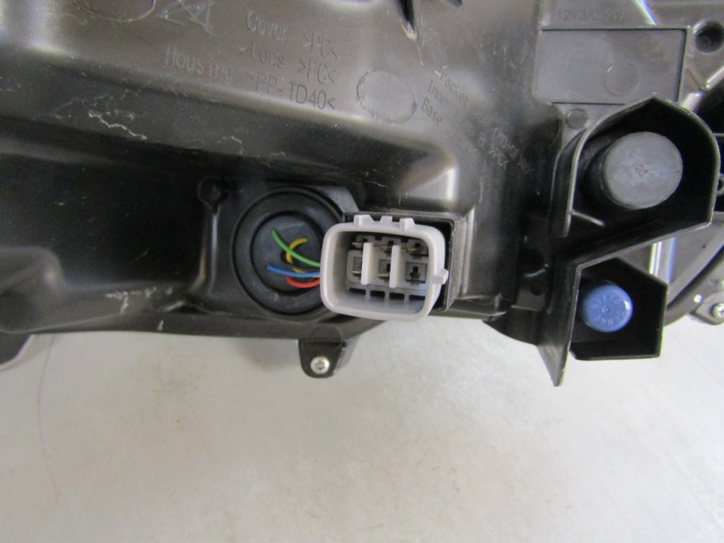 Prednji far TOYOTA COROLLA E21 SEDAN halogen sa sočivom LH 18- 81150-02T31-00