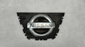 Maska (grill) Znaczek emblemat logo prednja NISSAN QASHQAI I J10 LIFT 09-